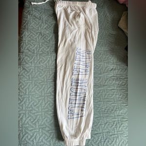 Garage Brand Size:Medium sweatpant Drawstring waist and elastic bands at ankles.